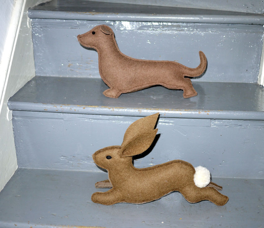 stuffed toy dachshund and hare